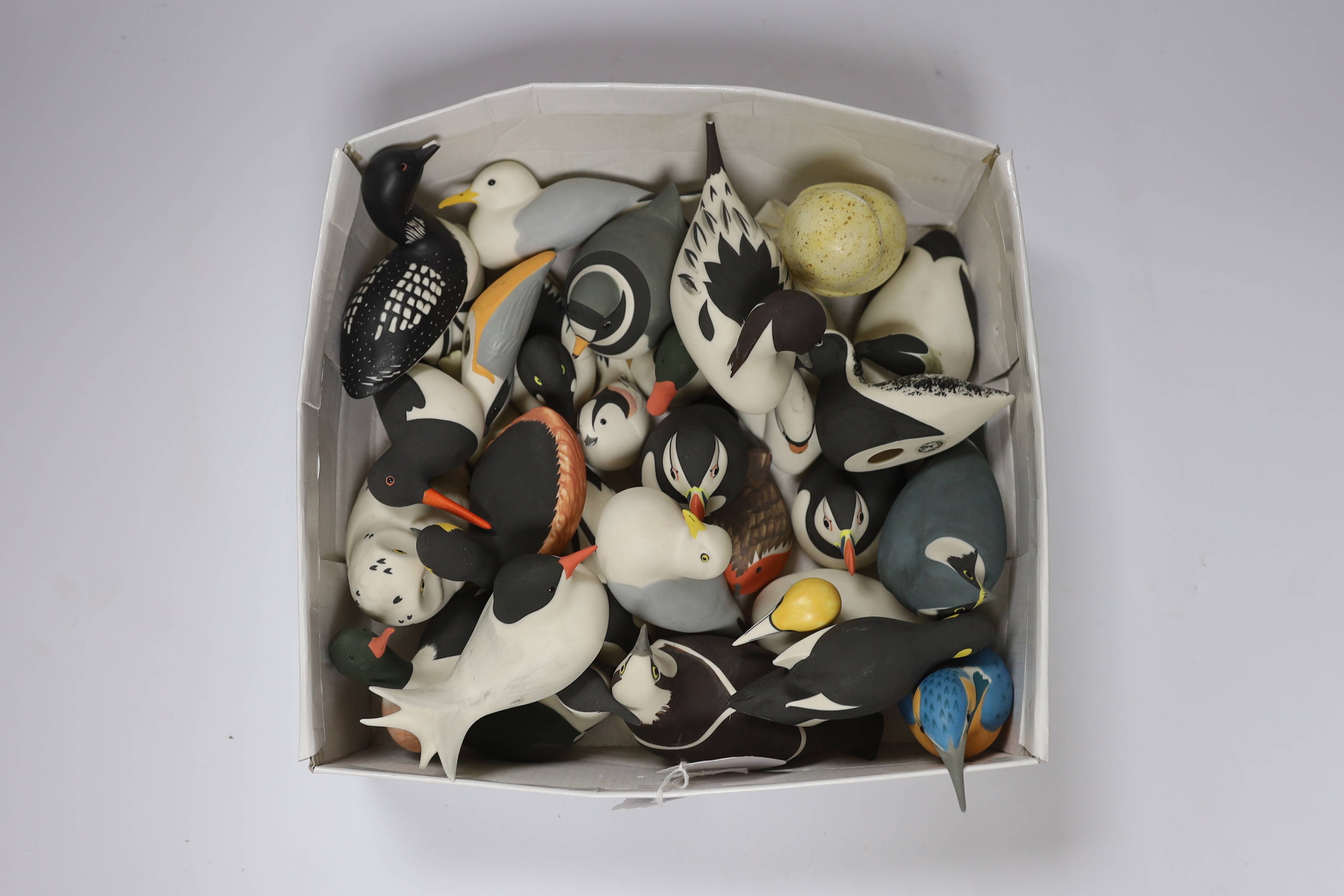 A collection of Isle of Arran ceramic birds